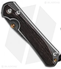 Chris Reeve Large Sebenza 31 Bog Oak (3.62" Boomerang Damascus) Right Hand -Chris Reeve Knives Shop Chris Reeve Large Sebenza 31 Bog Oak Boomerang Damascus Right Hand BHQ 137818 td spine 2